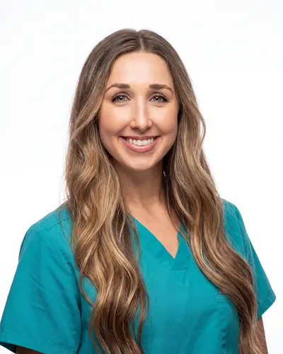 AI example made from that photo: the same woman in teal scrubs on a white background