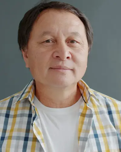 Original photo: an older man in a plaid shirt